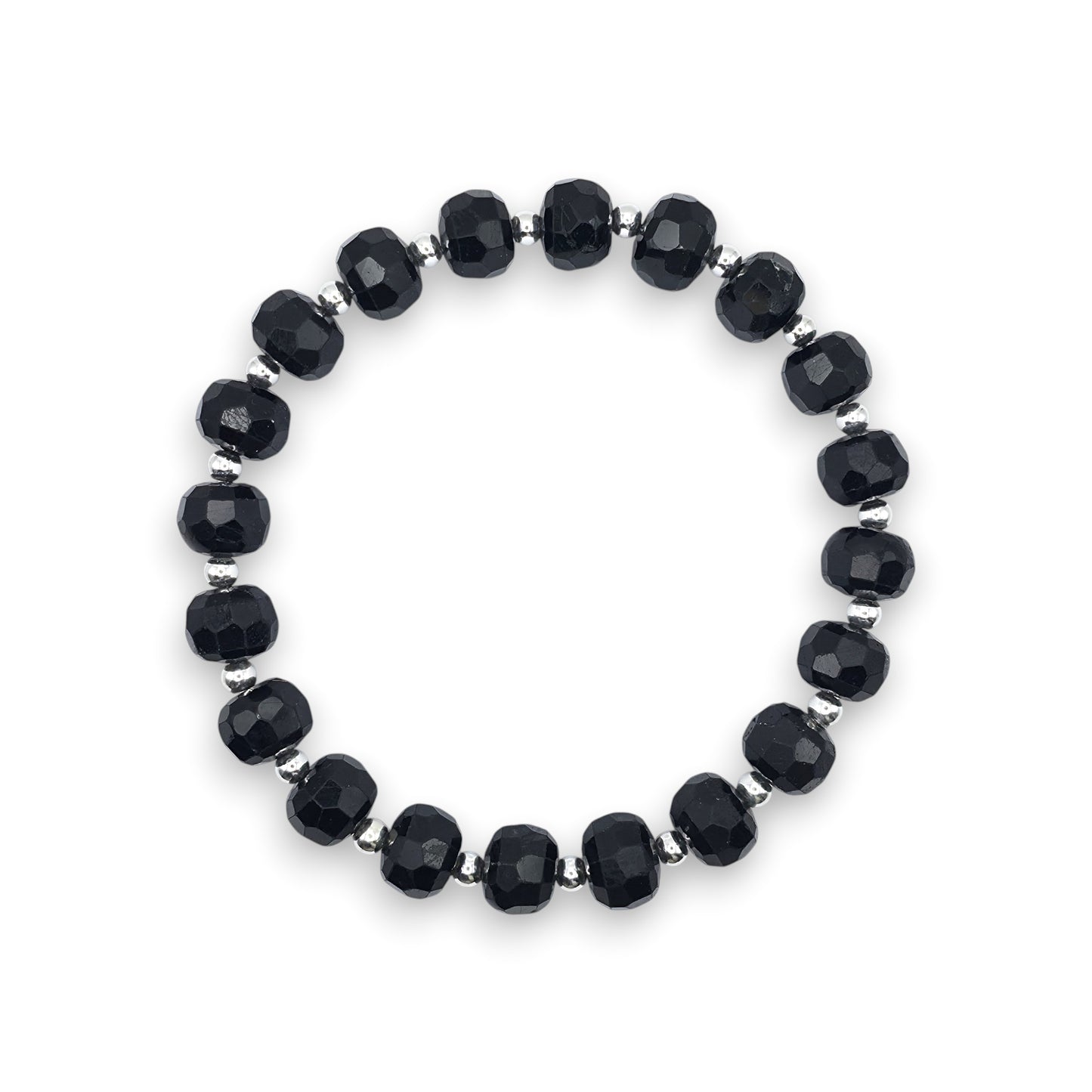 A beaded stretch bracelet featuring faceted Black Tourmaline beads separated by small silver spacer beads, displayed on a clean white background.