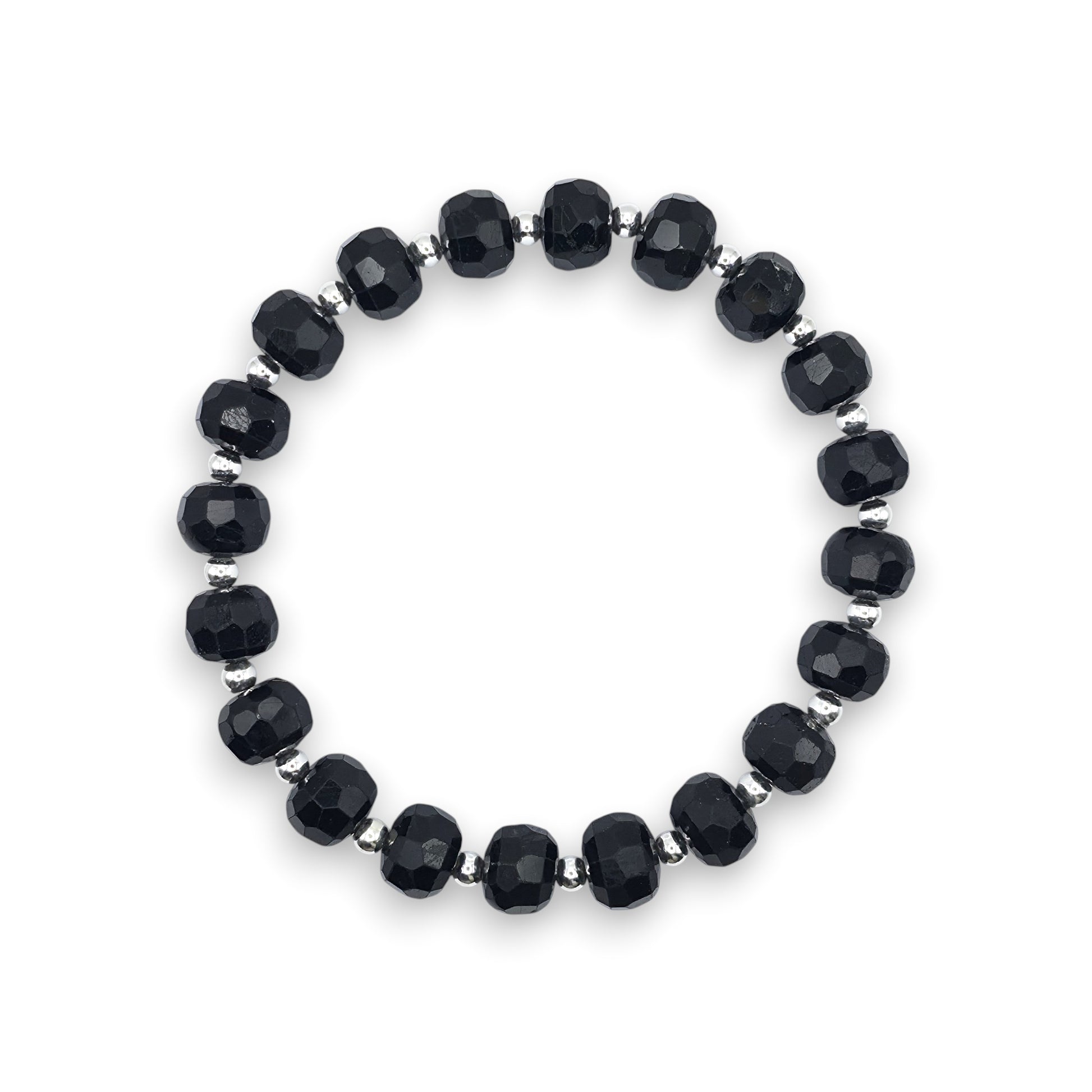 A beaded stretch bracelet featuring faceted Black Tourmaline beads separated by small silver spacer beads, displayed on a clean white background.