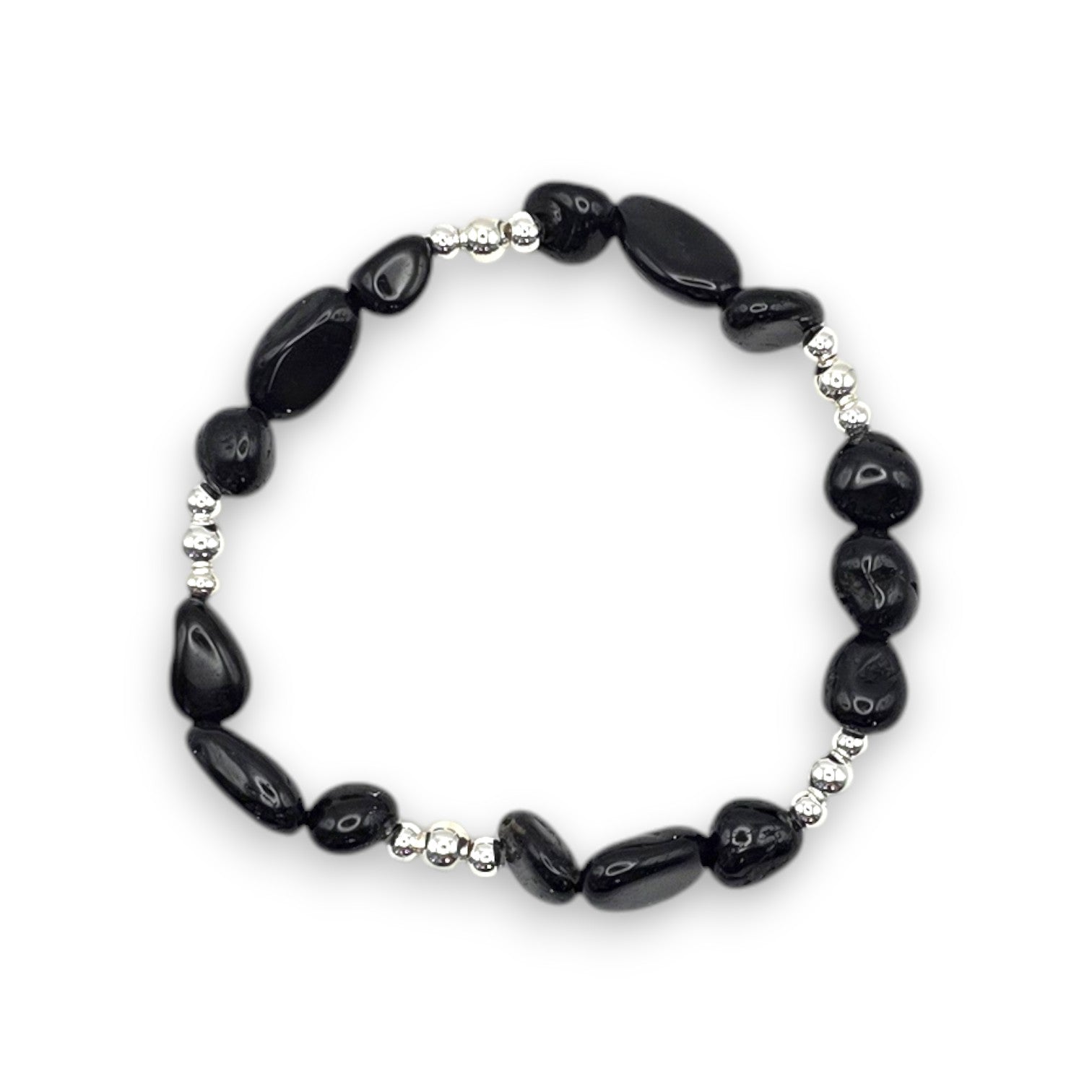 A beaded stretch bracelet featuring Black Onyx nugget beads separated by small silver metallic spacer beads, displayed on a clean white background.