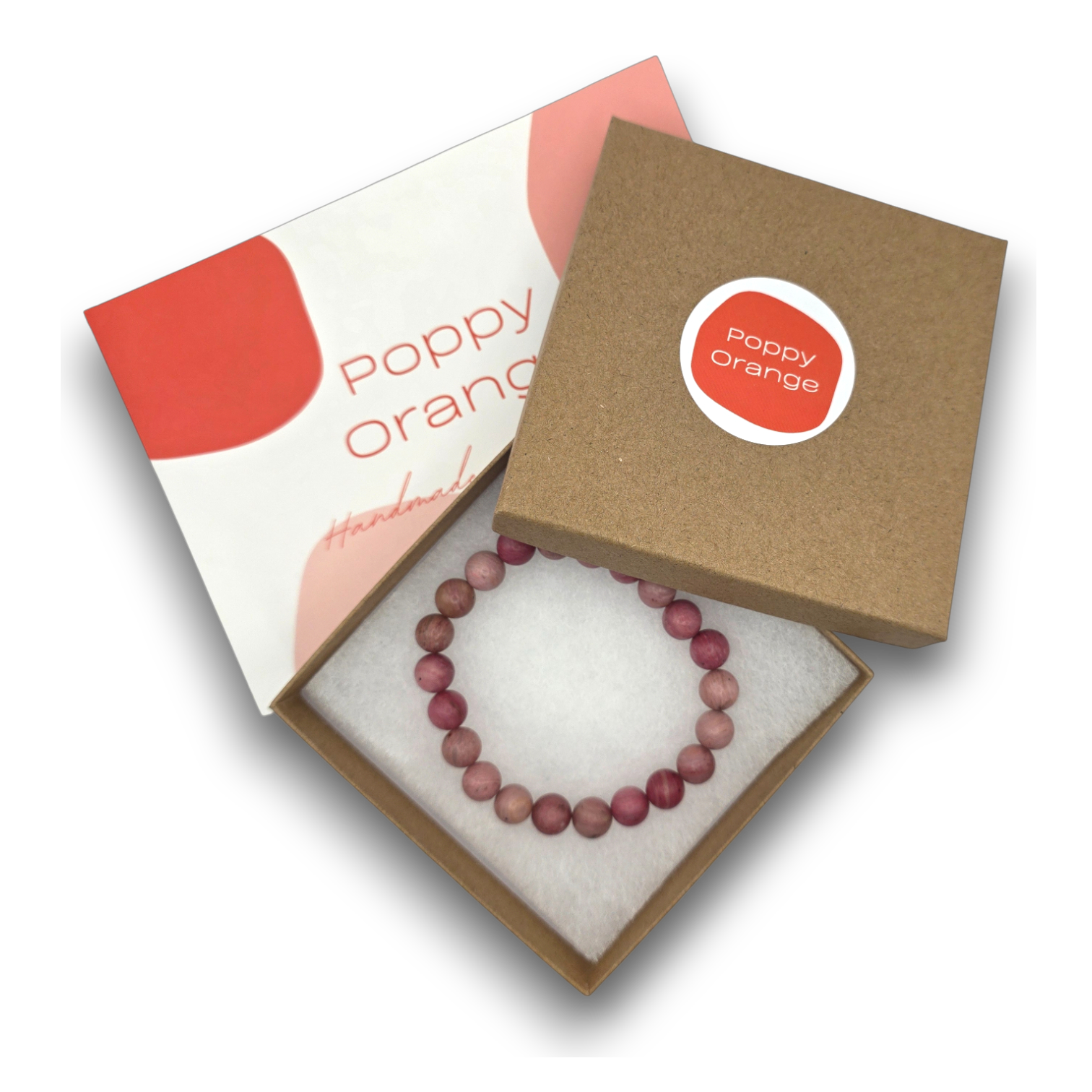 Handmade natural Rhodonite beaded bracelet in kraft packaging box with a card reading 'Poppy Orange Handmade'.