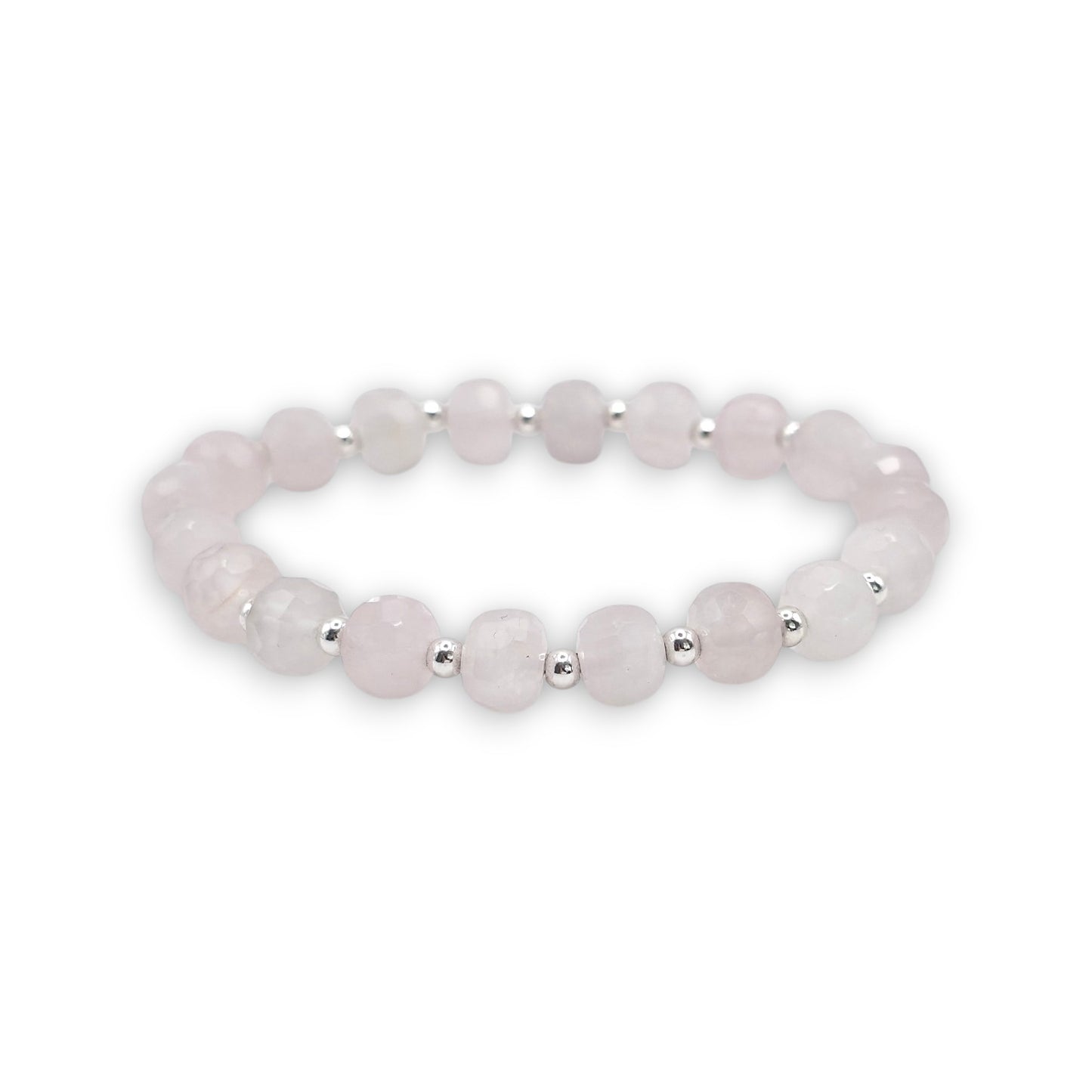 A beaded stretch bracelet featuring faceted pale pink Rose Quartz beads separated by small silver spacer beads, displayed on a clean white background.
